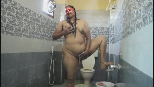 Desi Bhabhi Fingering Her Hairy Pussy While In Shower